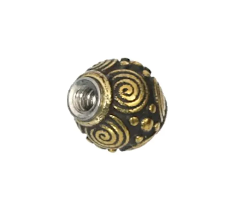The "Kugel Bauchnabelpiercing Brass Edelstahl gold" features a round bead with gold spirals and dot designs on a dark base, plus a silver metal-lined center—perfect for those who love unique retro vintage styles.
