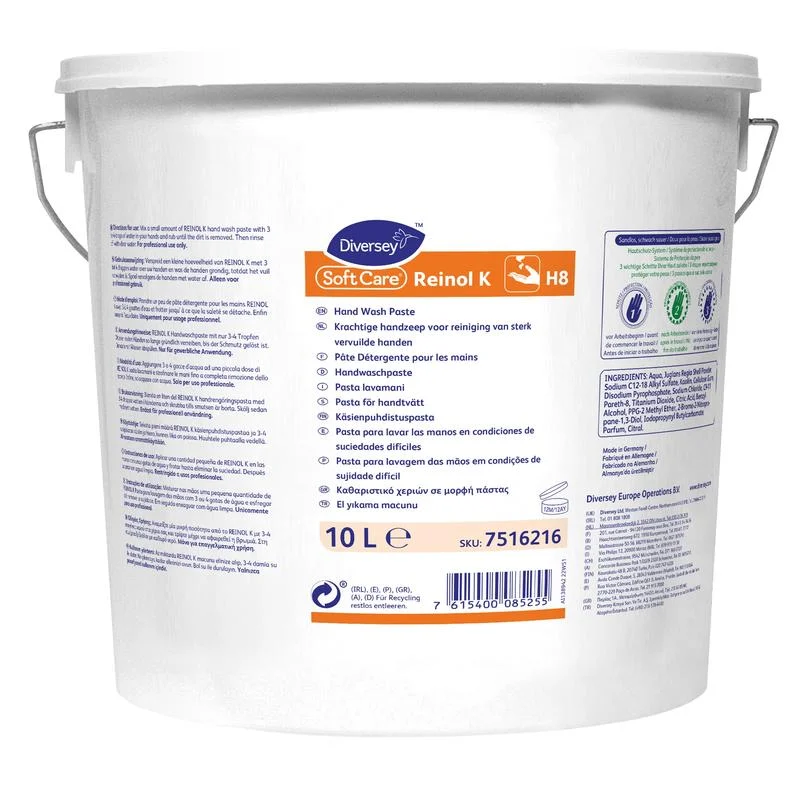 Ein weißer 10-Liter-Kunststoffeimer mit Henkel mit der Aufschrift „Soft Care Reinol K Handwaschpaste“ der Diversey Deutschland GmbH & Co. OHG. Das mehrsprachige Etikett ist für hartnäckige Verschmutzungen konzipiert und trägt ein orangefarbenes „H8“-Symbol sowie Produktdetails.